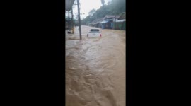 Floods wash away cars on Thai Full Moon Party island