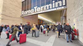 People leaving with their trolleys on December 30th, the penultimate day of the year, at the Termini Station in Rome.