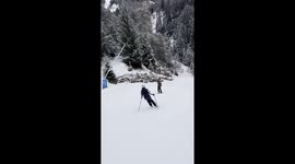 Snowboarder And Skier Have Mishap On Busy Slope