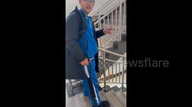 China: Boy's Cane Stair Jump Goes Wrong