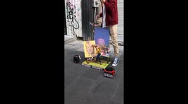Street Artist Paints With Marionette Puppet
