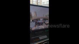 China: A Car Tries to Cross the Lane by Force