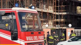 Firefighters, agents of the Rome Capital Police and police officers intervene in a building under construction illegally occupied by some people on the first day of the year on the Ostia seafront in the 10th Municipality of Rome.