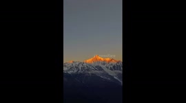 First golden sunrise of 2025 illuminates Meili Snow Mountain