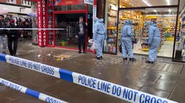 Forensics are working at the scene of a stabbing on Oxford Street in central London