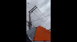 Parasol umbrella flies and hits diners in Sao Paulo, Brazil