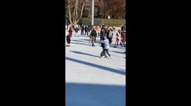 Adorable Elderly Couple Skate Together