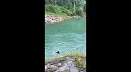 Friends save young woman being swept away by river in the Philippines