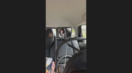 Baby vomits during car ride in Brisbane, Australia