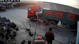 Shop owner prevents driverless large truck from rolling into vehicles