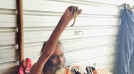 India: A Sadhu raise his hand since last 12 years