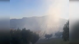 Italy: Firefighters Battle Blaze To Protect Homes In Ascoli