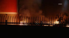 US, Los Angeles: Van Nuys Multiple Autos Set Ablaze Behind Car Dealership