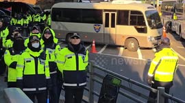 S. Korean investigators confront security service agents in attempt to arrest president Yoon