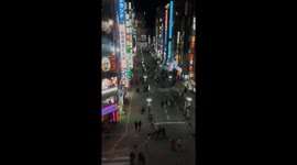 View of busy Shinjuku, Tokyo night street from the local cinema.
