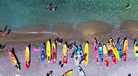 Aerial view of kayakers in Cala cerrada beach at the south of Spain