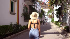 Gran Canaria  Spain - January 2 2024: People walk through streets of white town old city in Callao Beach, Gran Canaria, canary islands, Spain.