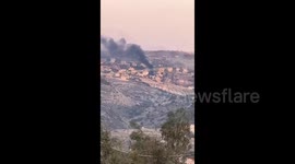 Lebanon: Israeli forces set fire to residential buildings in the town of Houla, southern Lebanon