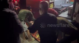 Gaza: The teams of the Palestine Red Crescent Society transported the bodies of two individuals and four injured persons from Al-Maghribi Street in Gaza City to Al-Ahli Baptist Hospital
