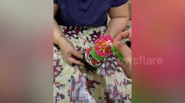Mother shocked by amusing birthday cake candle prank