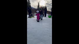 Exclusive- 14-month-old snowboarding pro wins hearts worldwide