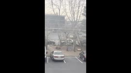 Car Drifts in Parking Lot