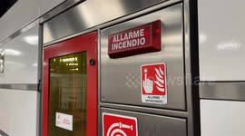 The fire alarm light flashes at Termini Station on the Metro line in Rome.