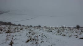 Snow hits Ivinghoe Beacon Buckinghamshire today as winter sets in for the UK