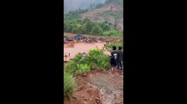 Raging flash floods wash away village homes in Indonesia