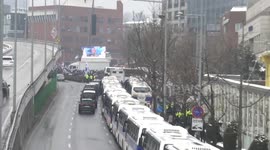 South Korea: Supporters, protesters gather at impeached South Korean president's residence