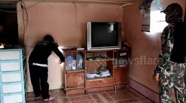 Huge wild cobra caught inside house in Thailand
