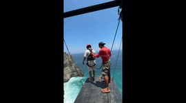 Bungee Jump- Osama fayyaz is jumping off a cliff in Nusa Pendia island, Bali - Indonesia