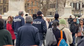 Two police officers guard Ponte Sant’Angelo on Epiphany Day in Rome.