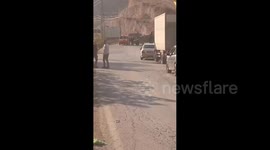 Israeli forces stop and search an ambulance at a checkpoint near Al-Badhan village, east of Nablus