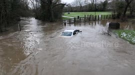 UK: Video shows car submerged by floodwaters as January brings wintry conditions including flooding