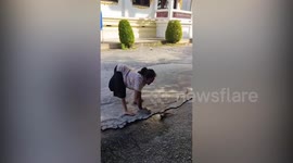 Polio survivor crawls on all fours as she seeks help to rebuild coffee shop
