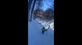 Tubers sliding down icy hill crash into safety supervisor