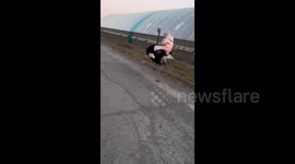 China: The Girl Knocked the Ostrich Over While Riding