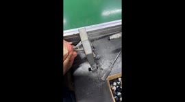 Machinery Puts Eyes And Hair On Dolls