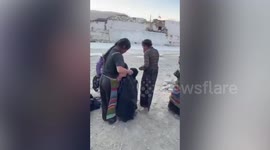 Tibet earthquake residents walk through rubble as death toll rises
