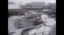 Snow pours down over High Wycombe in Buckinghamshire this morning