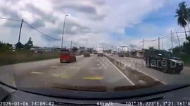 Oil tanker overturns towards oncoming cars before bursting into flames