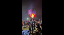 Lantern released for good luck turns evil firing sparks at worshippers below