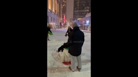 Residents play in the snow in Kansas City