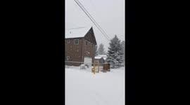 An intense wind storm  brought some snow in San Bernardino Mountains, California
