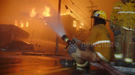US, Los Angeles: Pacific Palisades Palisades Fire Destroys Apartment Building and Gas Station Part 6