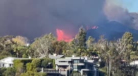 US: Palisades Fire Forces Tens Of Thousands To Evacuate As State Of Emergency Declared 17