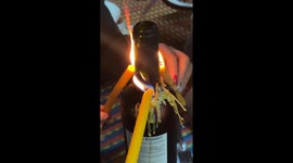 Friends use candle hack to remove cork pushed inside wine bottle