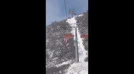 Child survives falling 40ft from ski lift in China