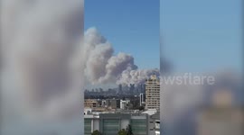 Smoke from Pacific Palisades wildfire billows across skyline